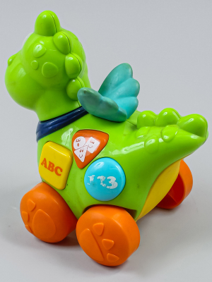 Игрушка динозавр