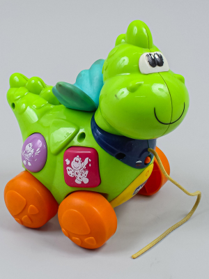 Игрушка динозавр